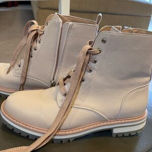 Cream color combat style boots.  Size 8